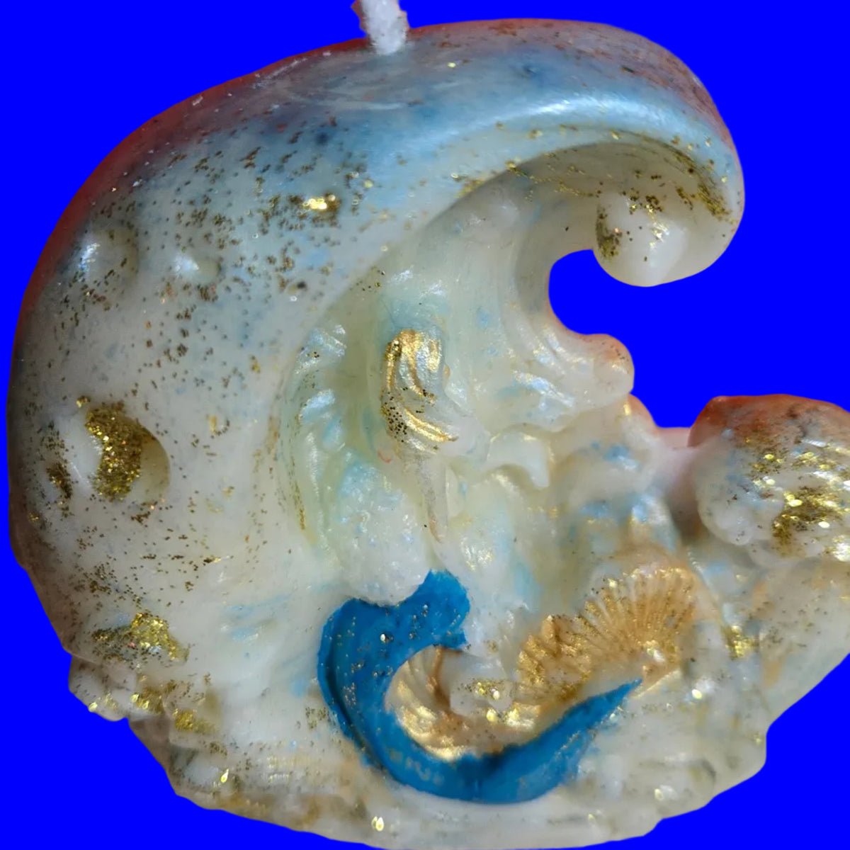 MERMAID UNDER THE CURL IN THE OCEAN